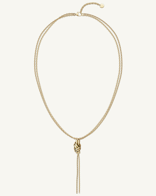 Necklace in gold plated-316L stainless steel from Waldor & Co. The model is Dual Knot Necklace Polished.