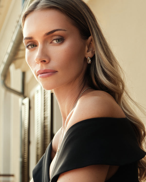  Earrings in silver and gold plated-316L stainless steel from Waldor & Co. The model is Dual Knot Earring Polished.