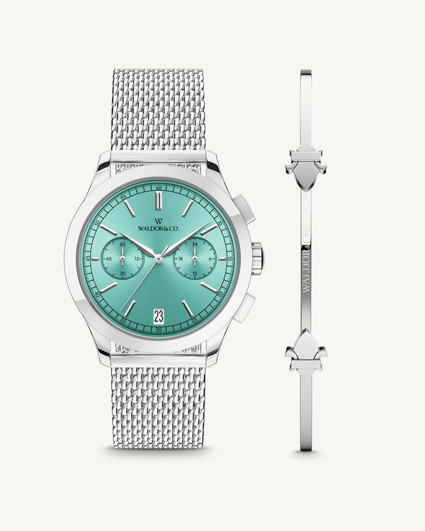 A round mens watch in rhodium-plated silver from Waldor & Co. with turquoise sunray dial and a second hand. Seiko movement. The model is Chrono 39 Sardinia 39mm.