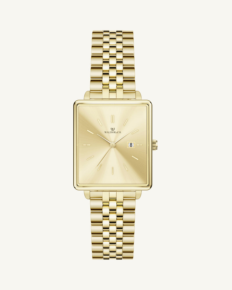 A square womens watch in silver and 14k gold from Waldor & Co. with gold sunray dial and a second hand. Seiko movement. The model is Delight 32 Chelsea 28x32mm.