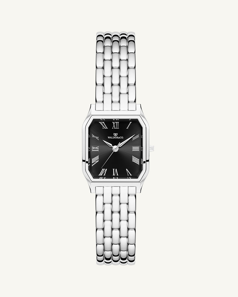 A square womens watch in silver plated 316L stainless steel from Waldor & Co. with black Diamond Cut Sapphire Crystal glass dial. Seiko movement. The model is Eternal 22 Bellagio