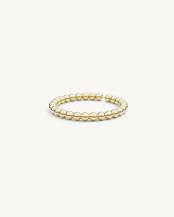 A Ring in 14k gold-plated stainless steel from Waldor & Co. The model is Petite Ring Polished.